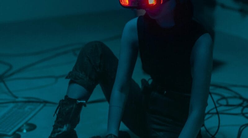 Professional gamer competing in a sold-out stadium during one of the major VR Esports tournaments of 2026.